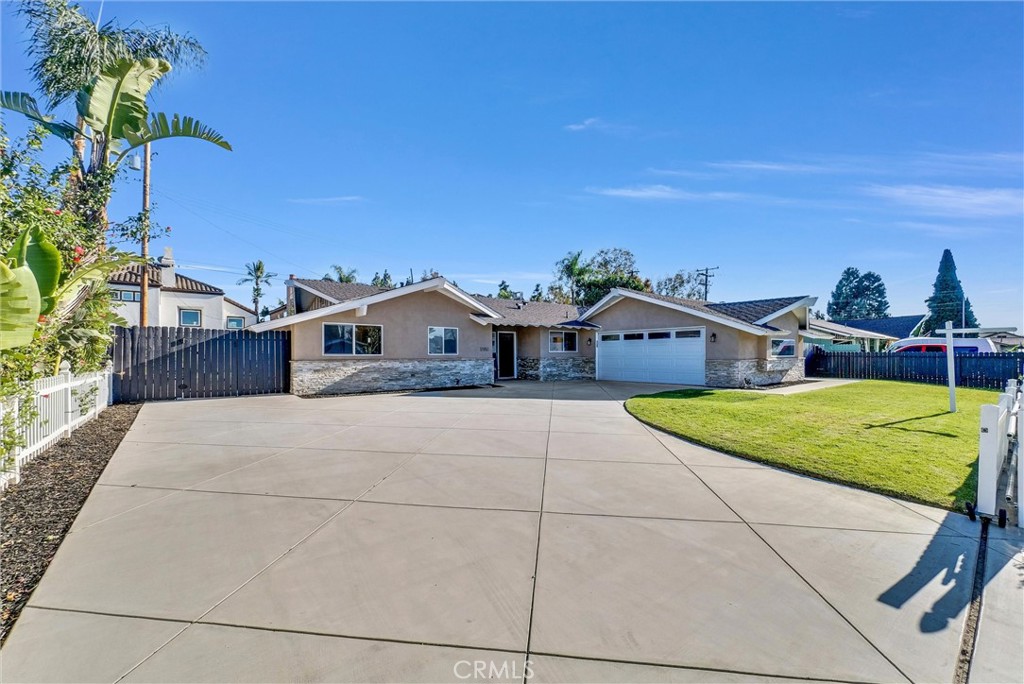 Wow! This four bedroom family home has so much space and even offers a semi-circular driveway and possible RV/Vessel parking on both sides of the home.