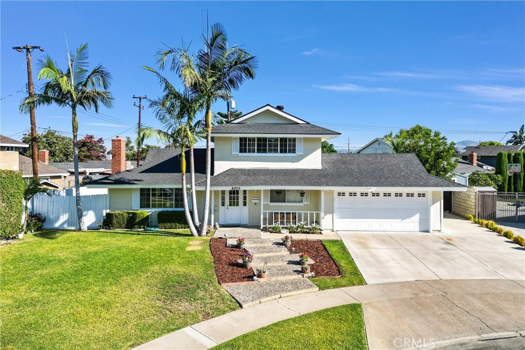 a house with garden in front of it