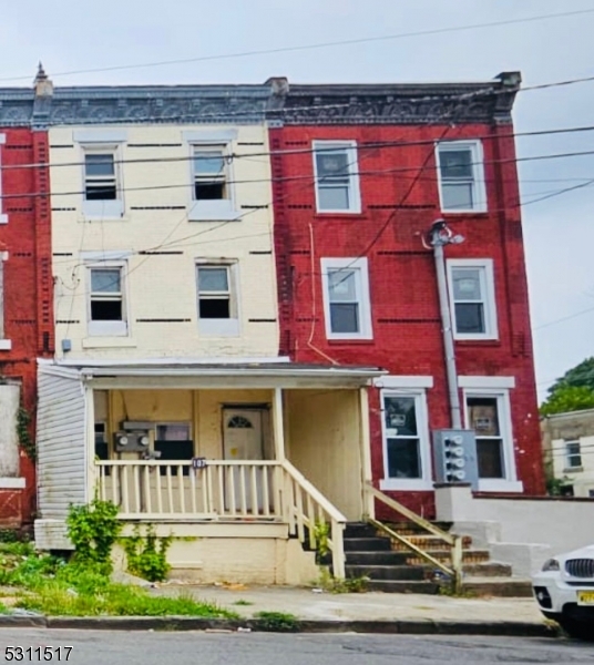 a front view of a multi story residential apartment building