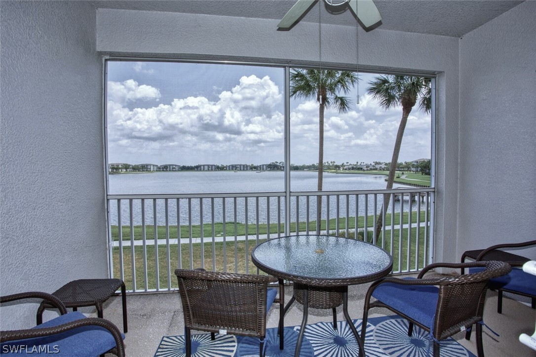 a view of a chairs and table in patio