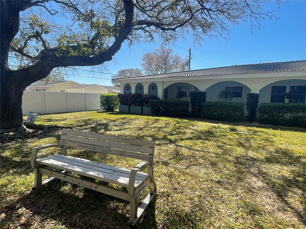 a view of a yard with an outdoor space