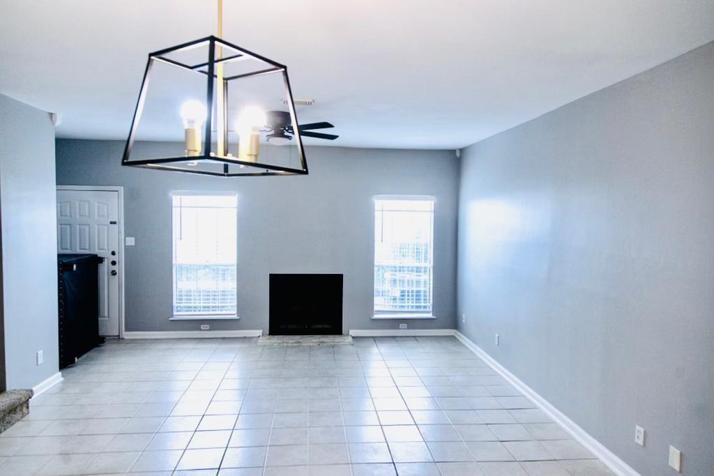 a view of a livingroom with a fireplace