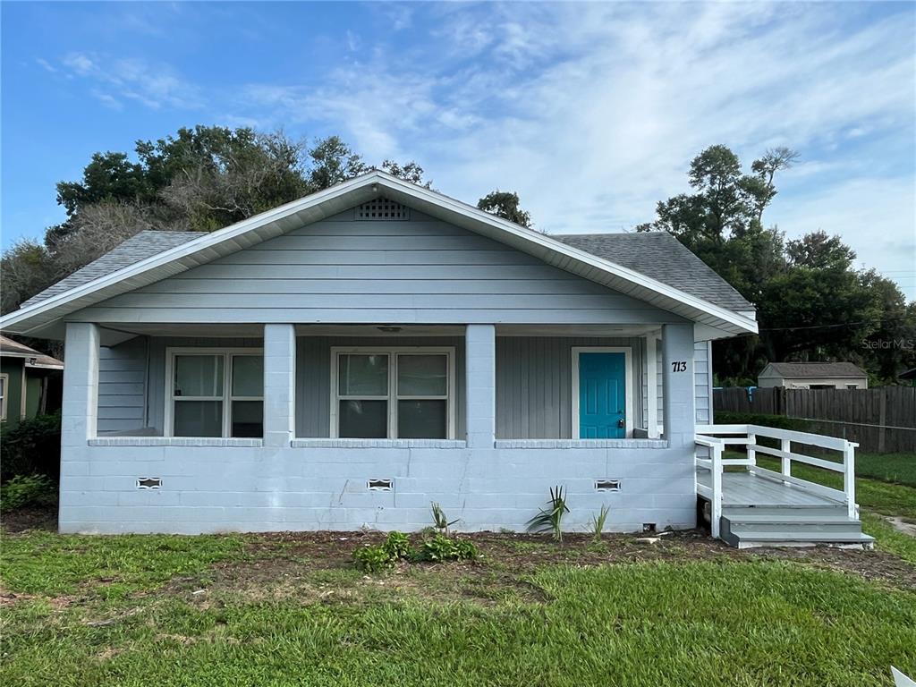 front view of a house with a yard