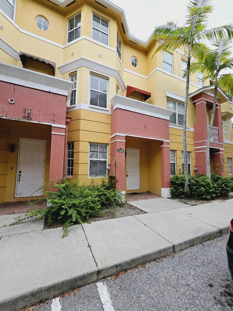 a front view of a multi story residential apartment building