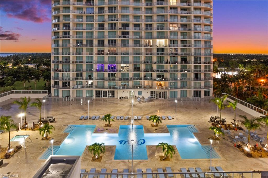 a picture of a water fountain and a building view