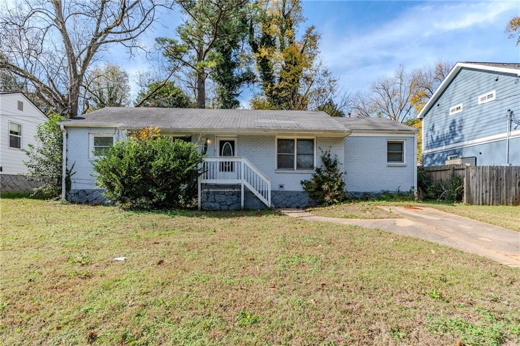 front view of a house with a yard