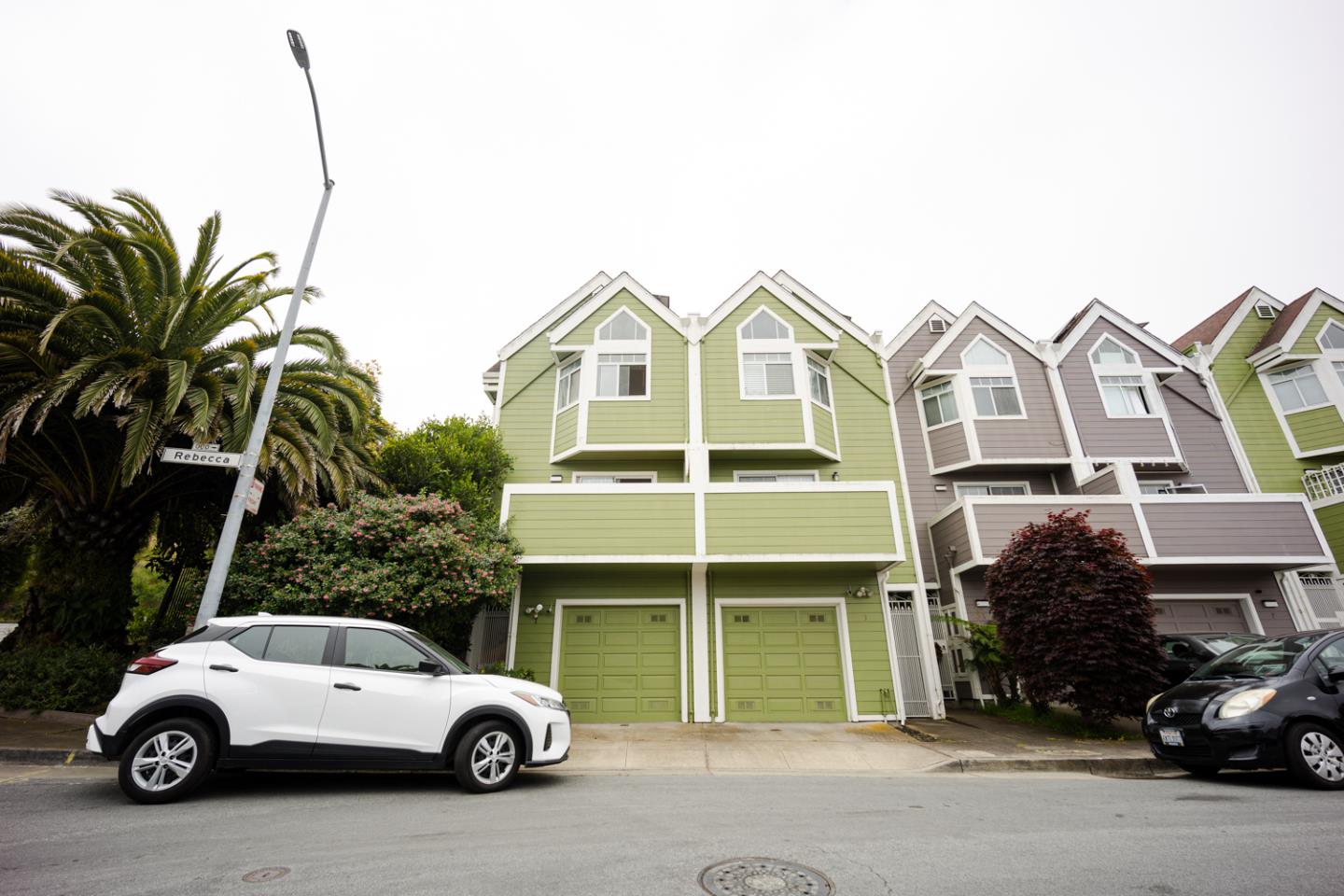 a car parked in front of a house