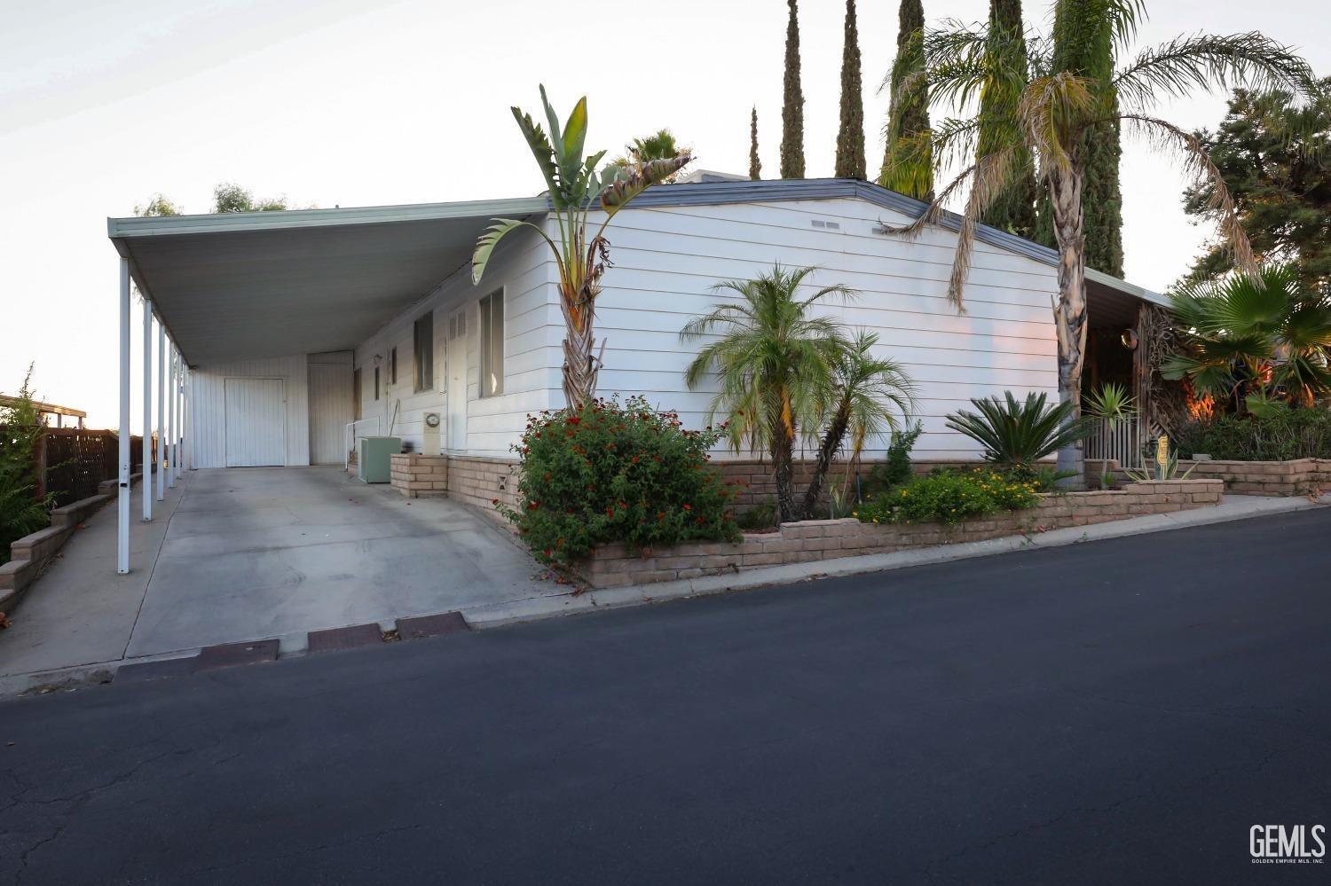 a front view of house with small garden