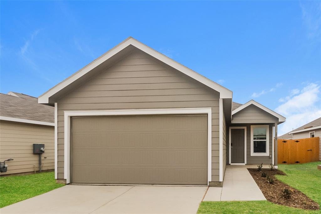 a front view of house with yard