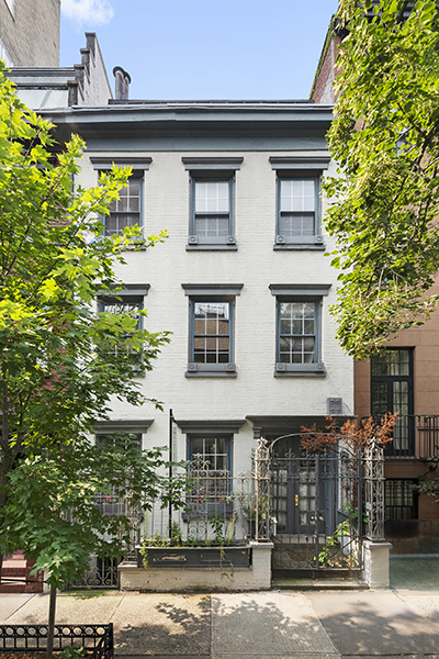 a front view of a house with street