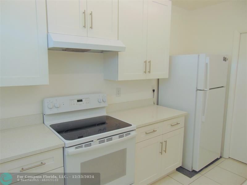 NEW CABINETS NEW QUARTZ COUNTERS