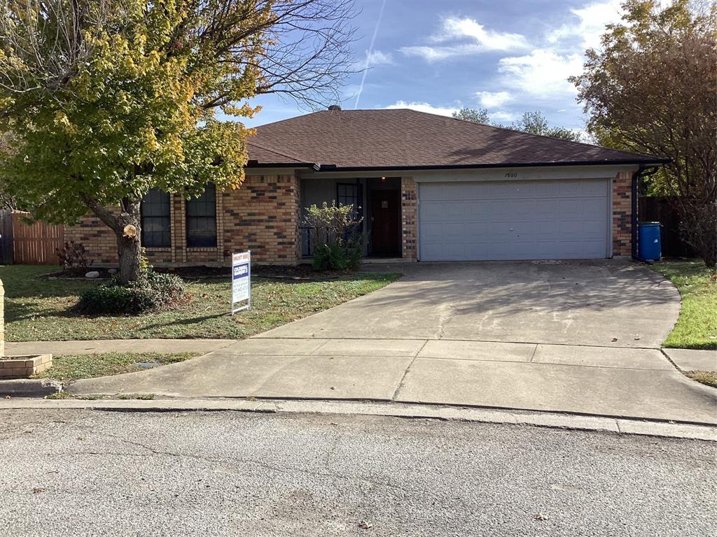 a view of a house with a garage