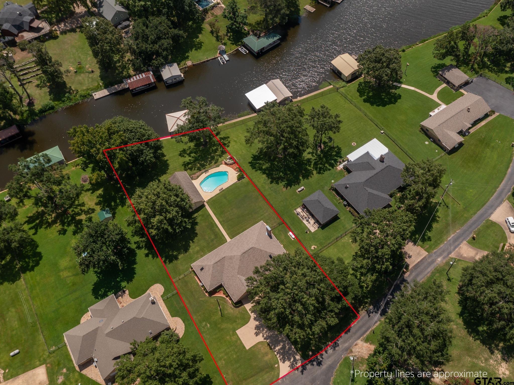 an aerial view of a house with a garden