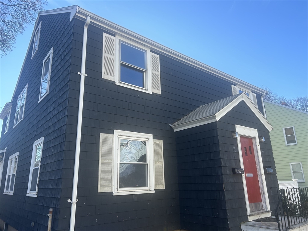 a front view of a house with a porch