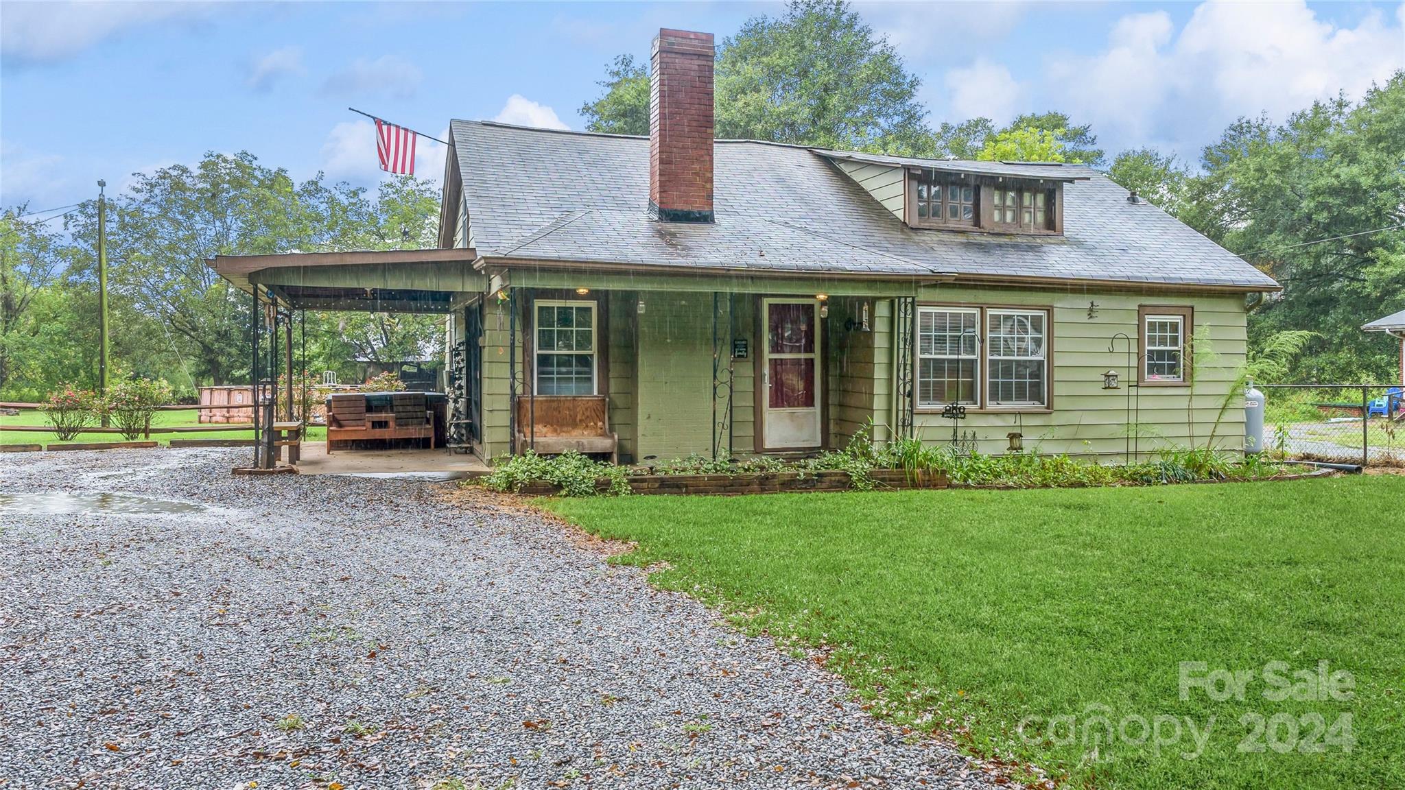 front view of a house with a yard