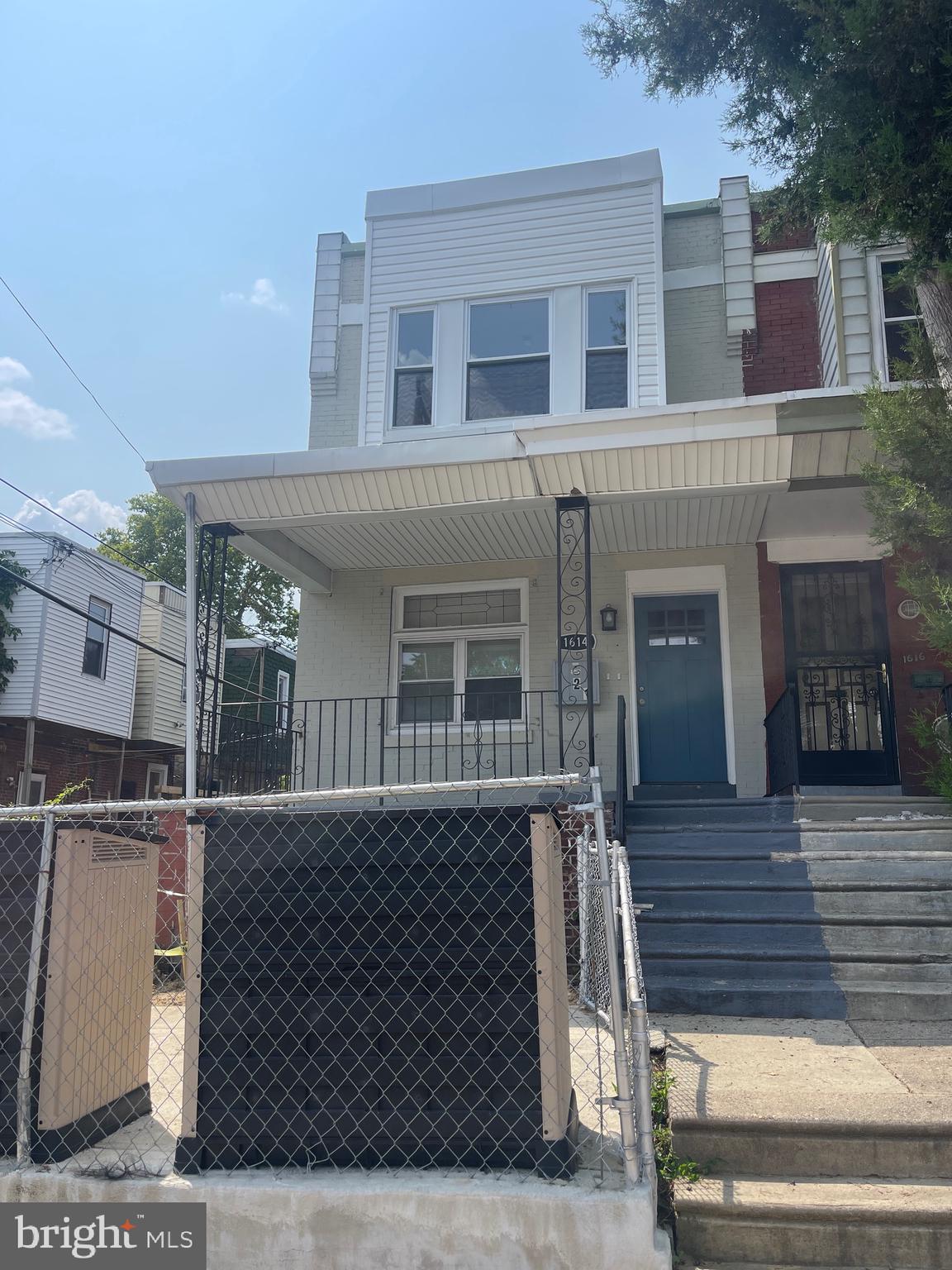 front view of a house with a balcony