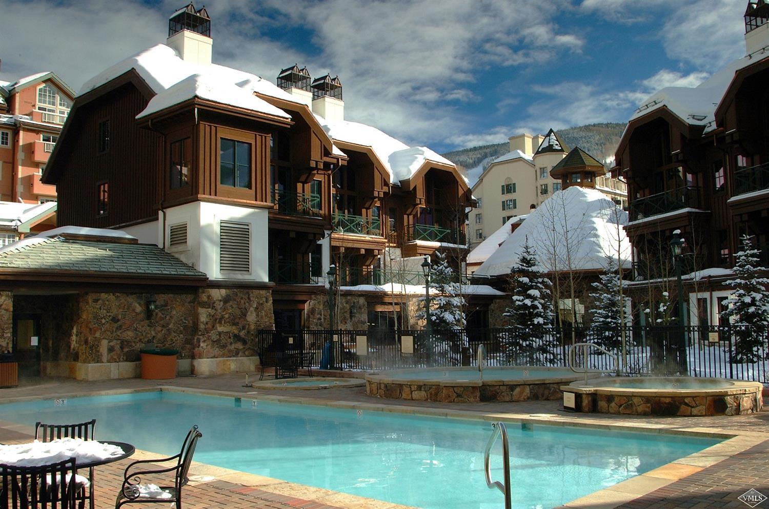 a view of a house with swimming pool