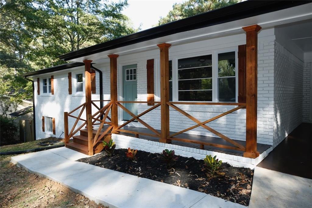 a house view with a garden space