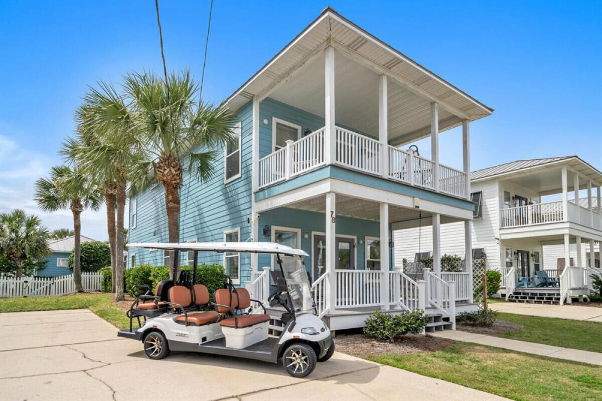 a car parked in front of a house