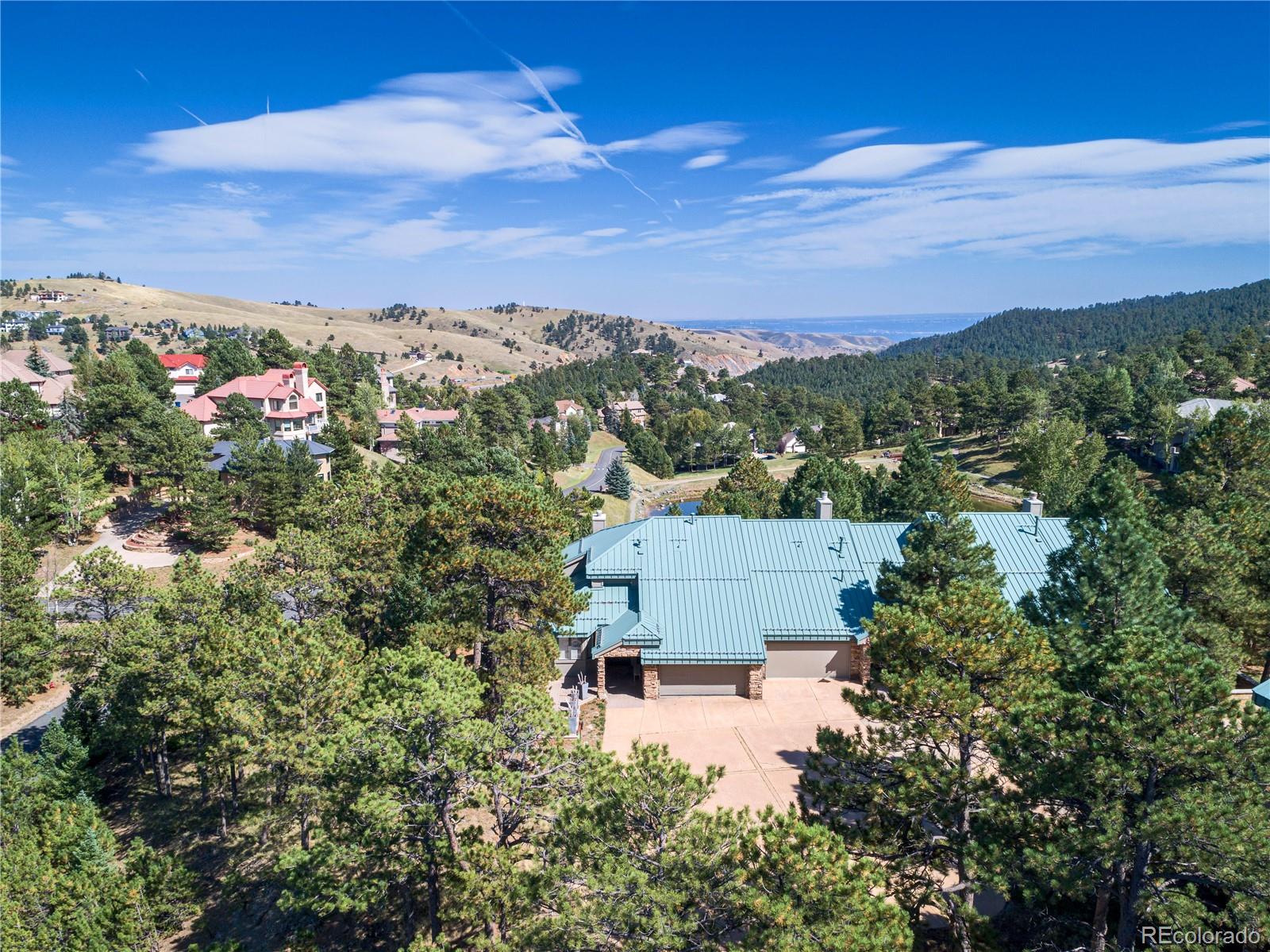 an aerial view of a house with a garden