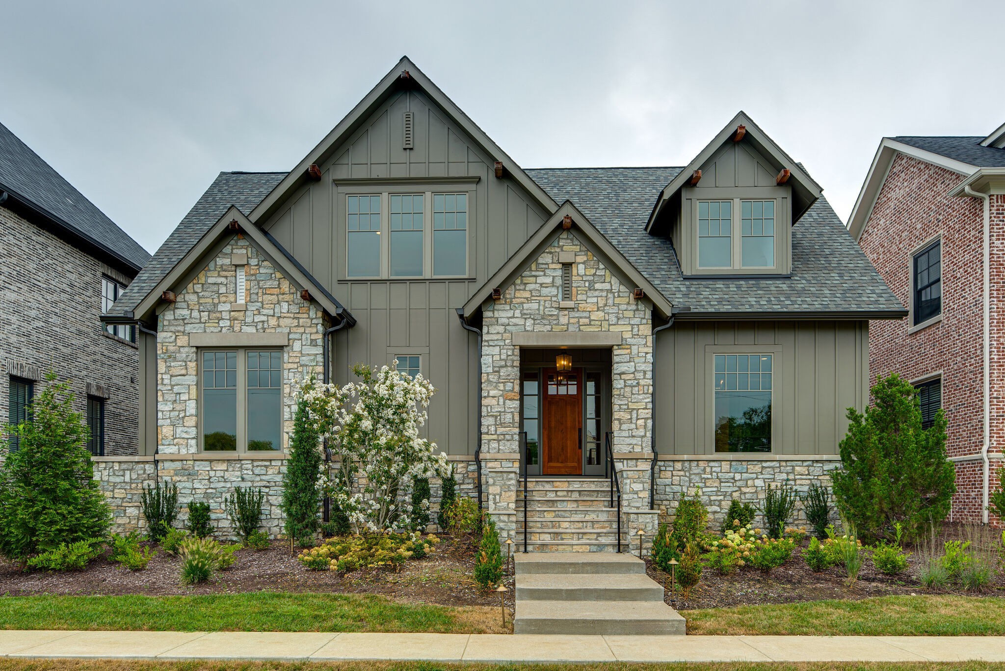 front view of a house with a yard