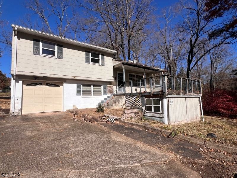 a front view of a house with a garage