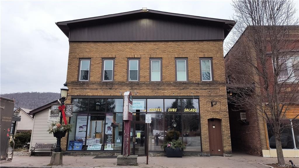 a front view of a building with street