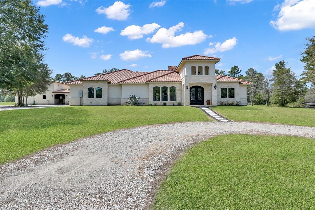 This elegant single-story home featuring a Spanish Hacienda style has a 50 year warranty on the clay roof.  The stucco is class b, impact resistant with hurricane ties, and has 6 inch stud walls.