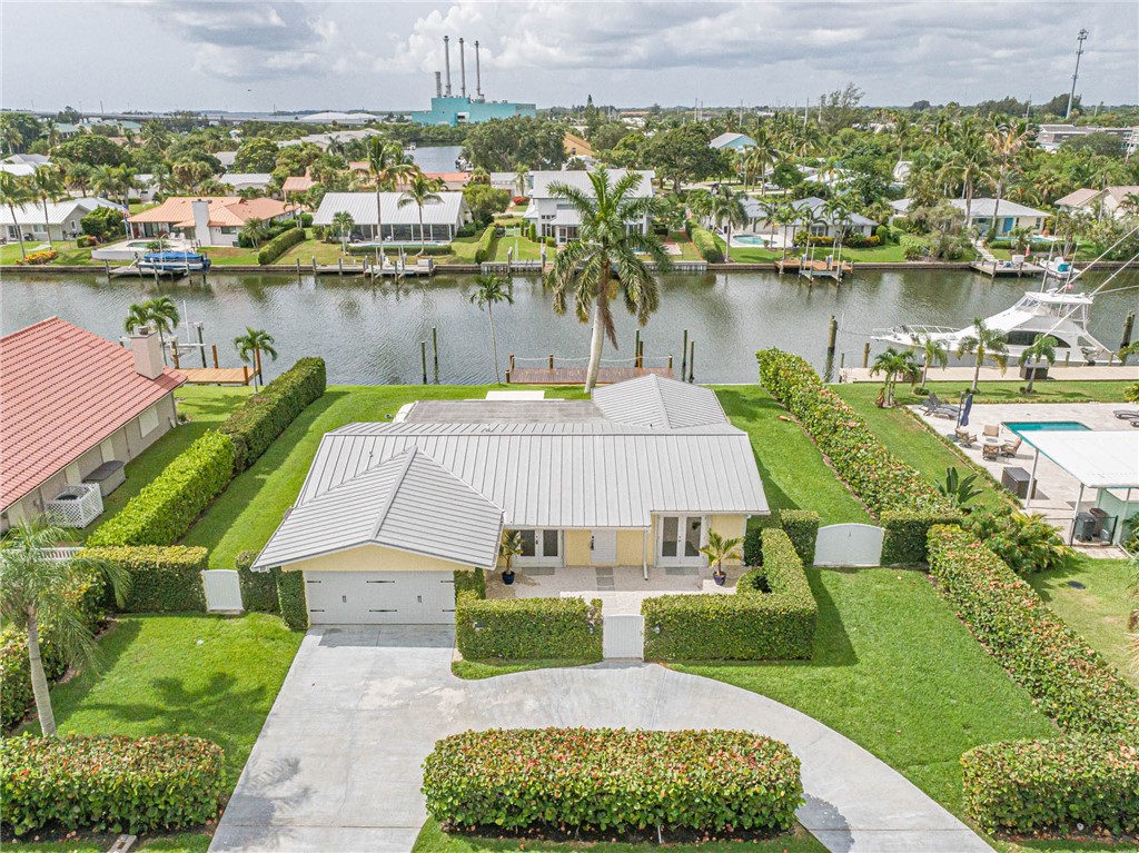 a aerial view of a house with a lake view