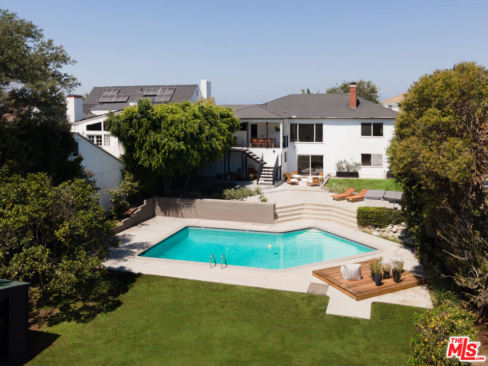 a house with garden in front of it