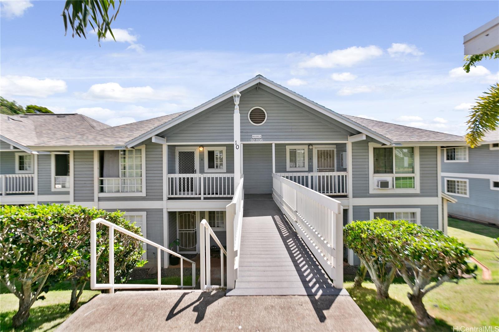 a front view of a house with a porch