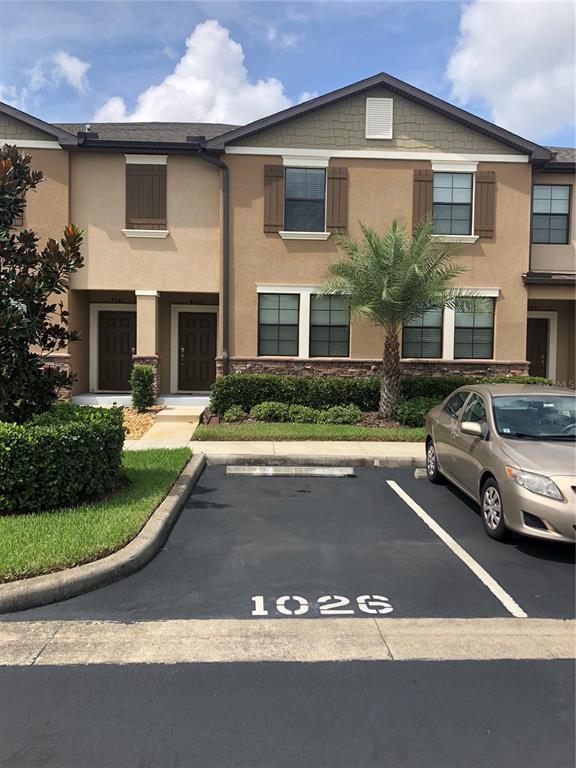 a view of multiple house with garage