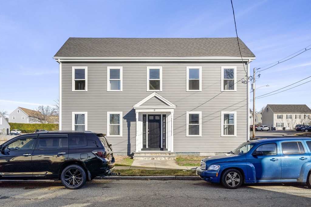 a car parked in front of a house