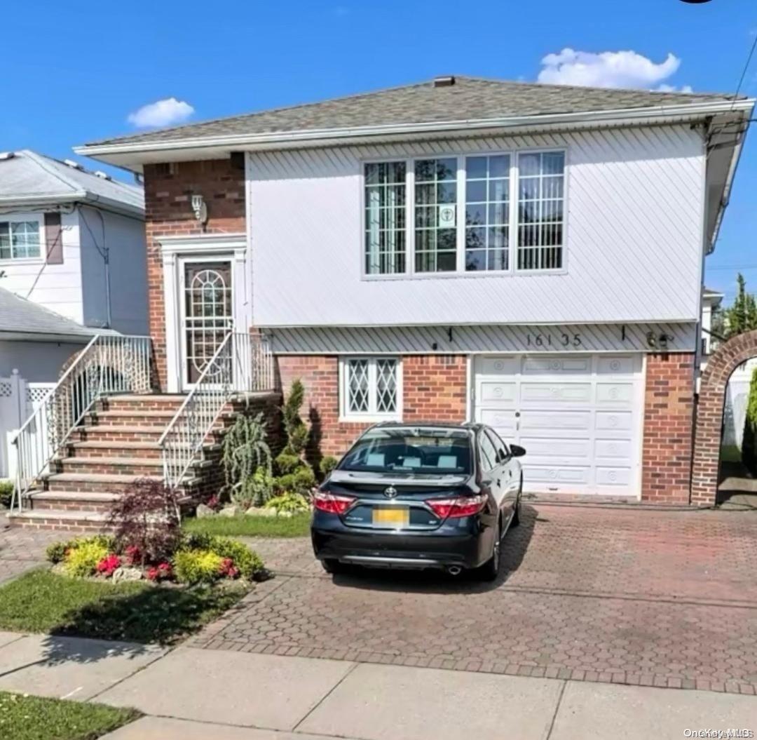 a car parked in front of a house