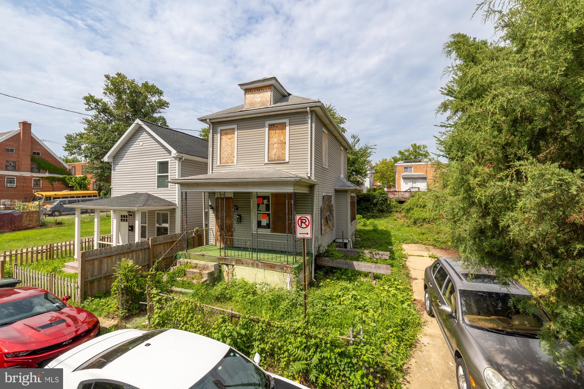 a front view of a house with swimming pool