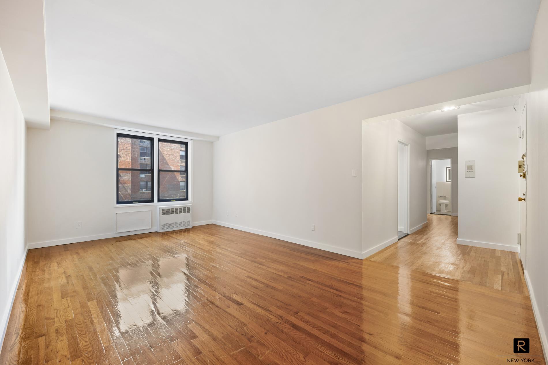 a view of an empty room and window