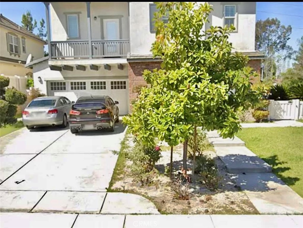 a front view of a building with garden