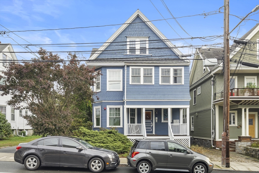 a front view of a house with parking