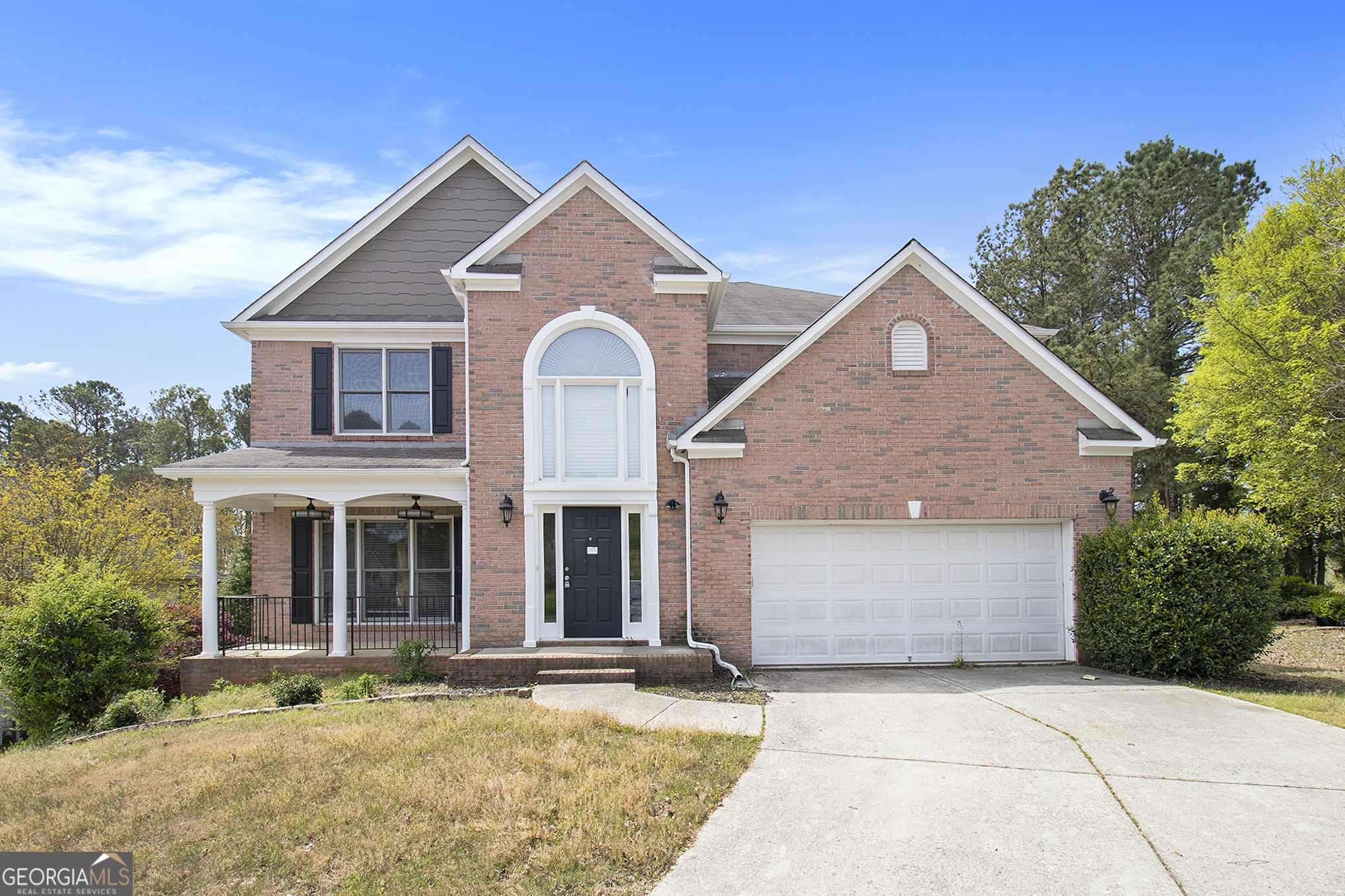 front view of house with a yard