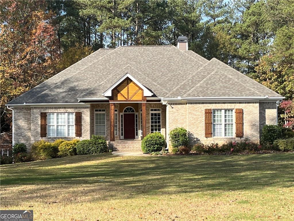 a front view of a house with swimming pool