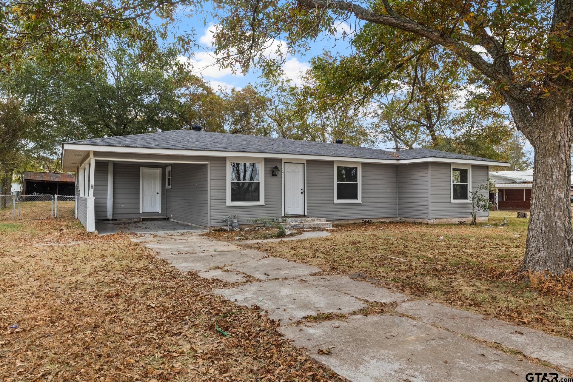 front view of house with a yard