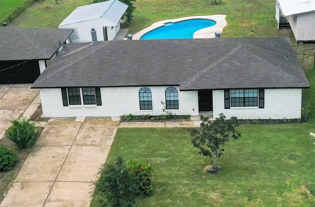 a house view with a garden space