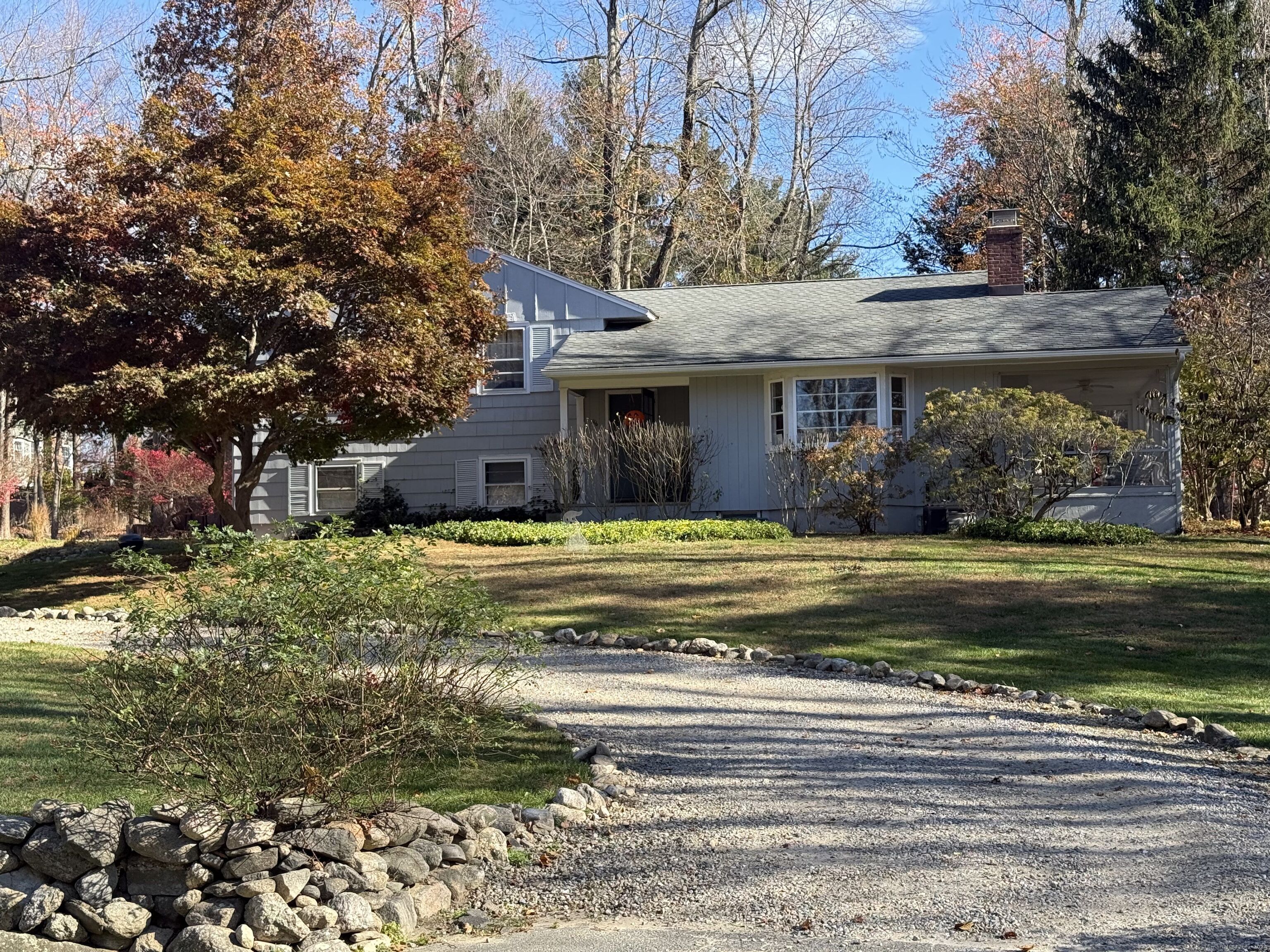 a view of a house with a yard