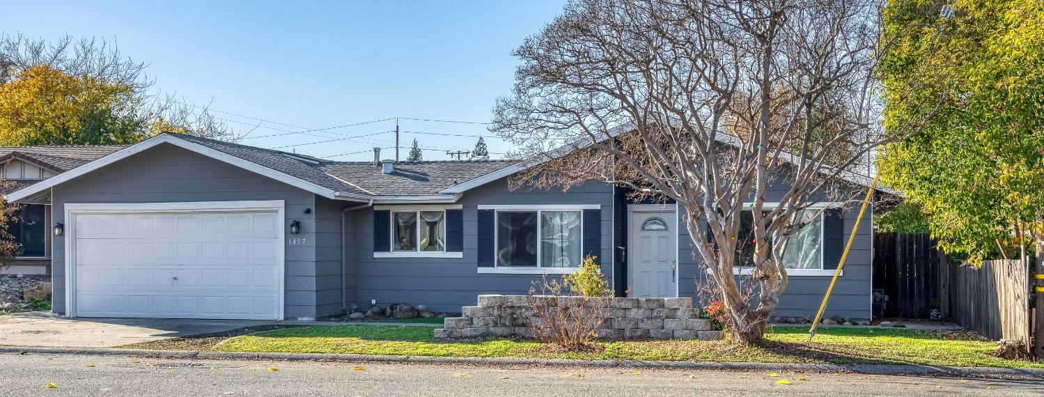 a front view of house with yard