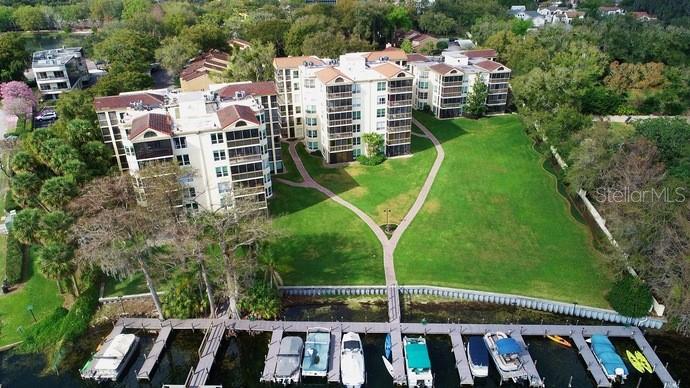 a aerial view of a house with a yard