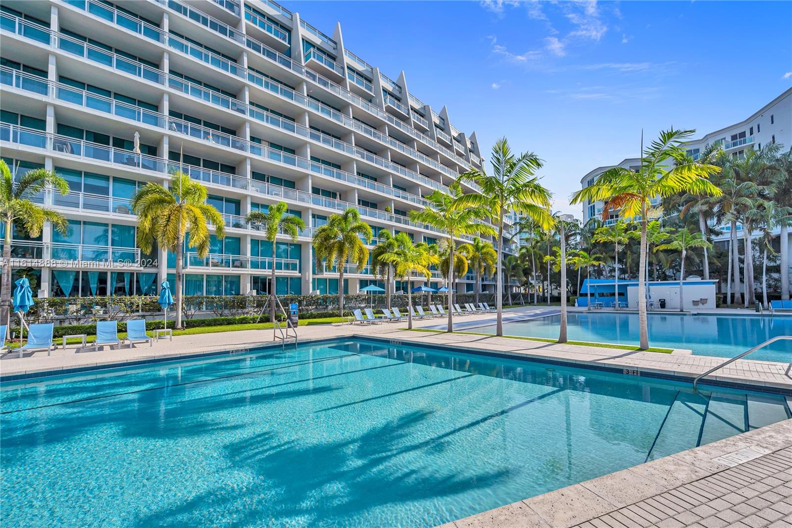 a view of yard with swimming pool and patio