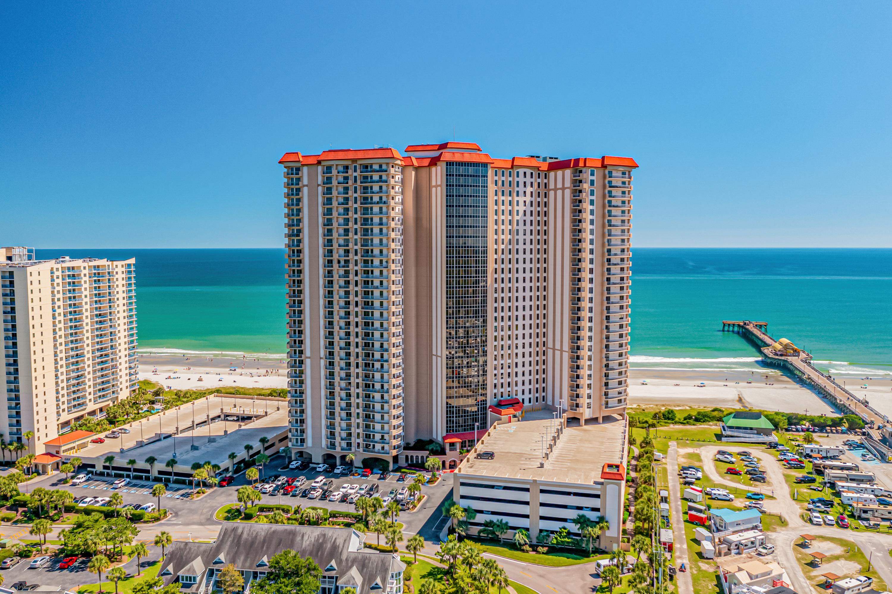 Bird's eye view with a water view and a beach view