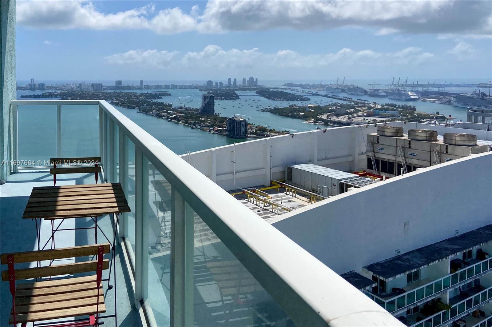 a view of a balcony with city