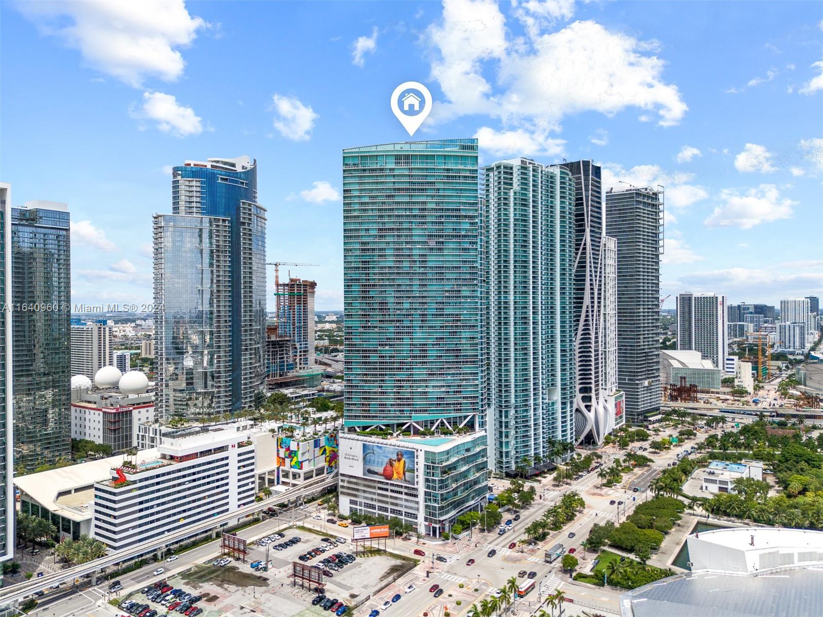 a view of city with tall buildings