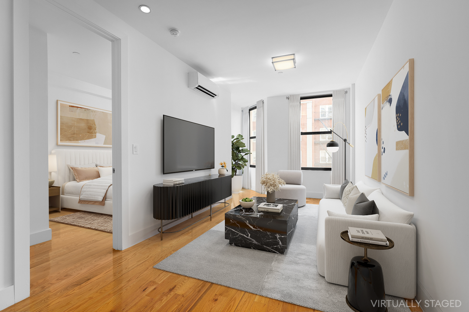 a living room with furniture and a flat screen tv